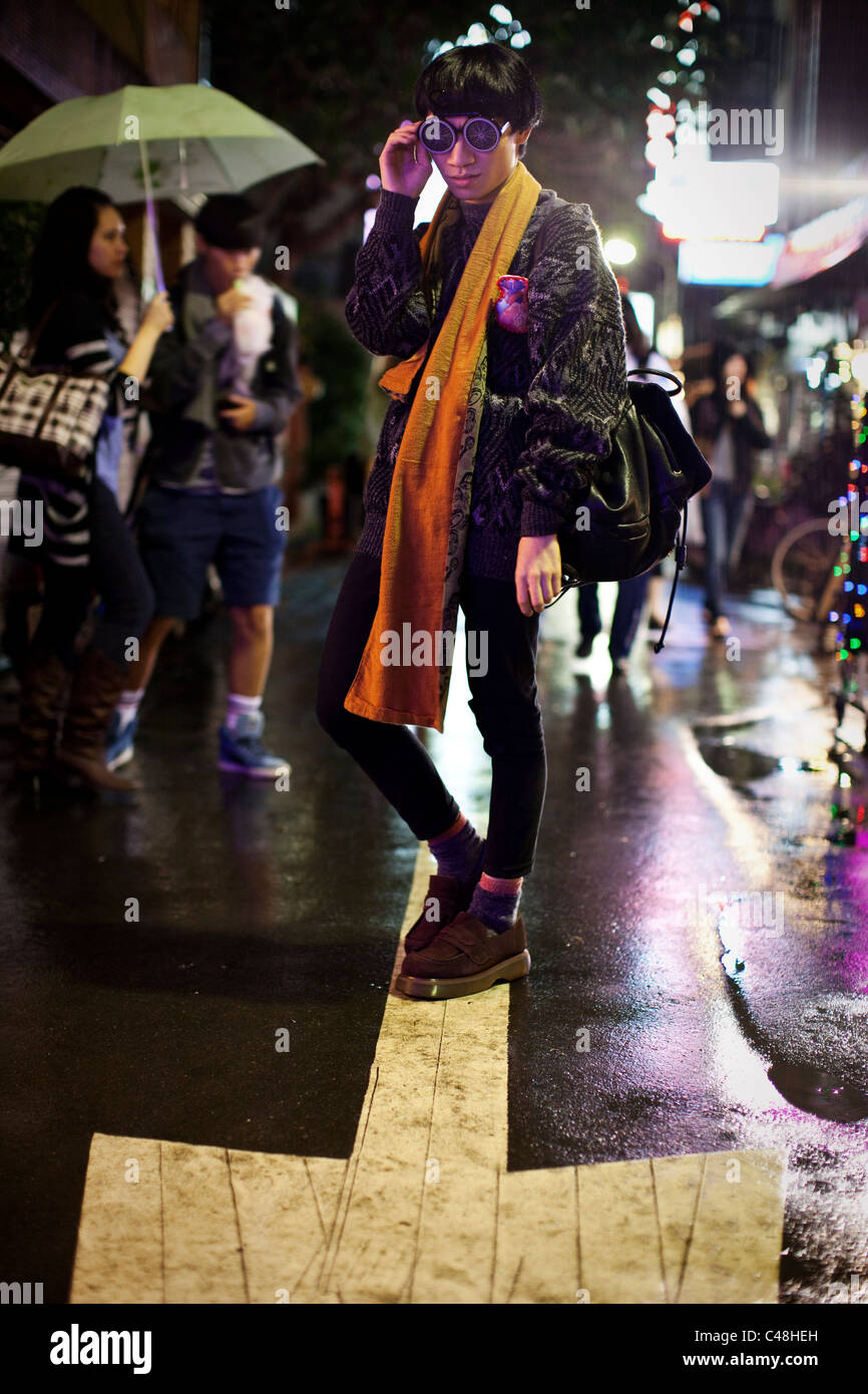 Portrait of a young man on the street at the Shida Road Night Market, Taipei, Taiwan, November 5, 2010. Stock Photo