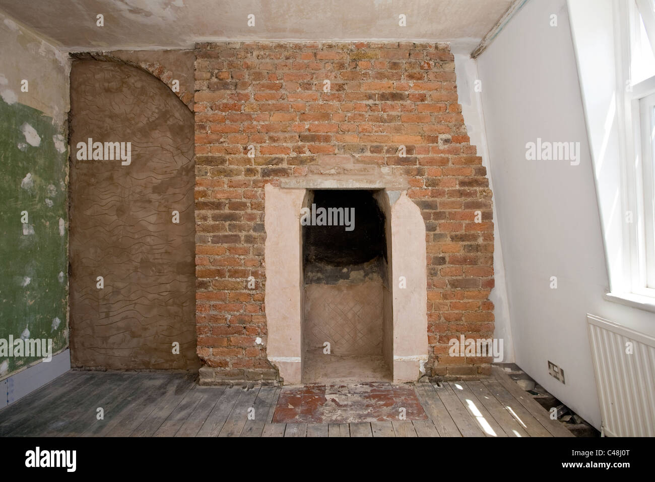 Brick Wall And Brick Wall Undergoing Renovation London England