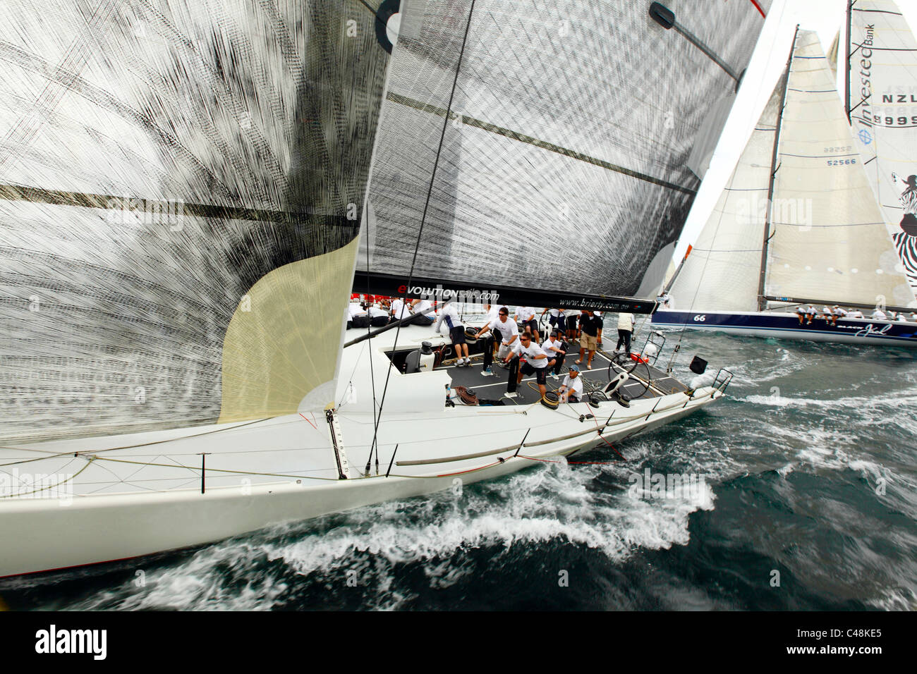 The Yacht Limit in  a close call at the start of the The  SOLAS Big Boat challenge 2009 in Sydney Harbour, Australia. Stock Photo
