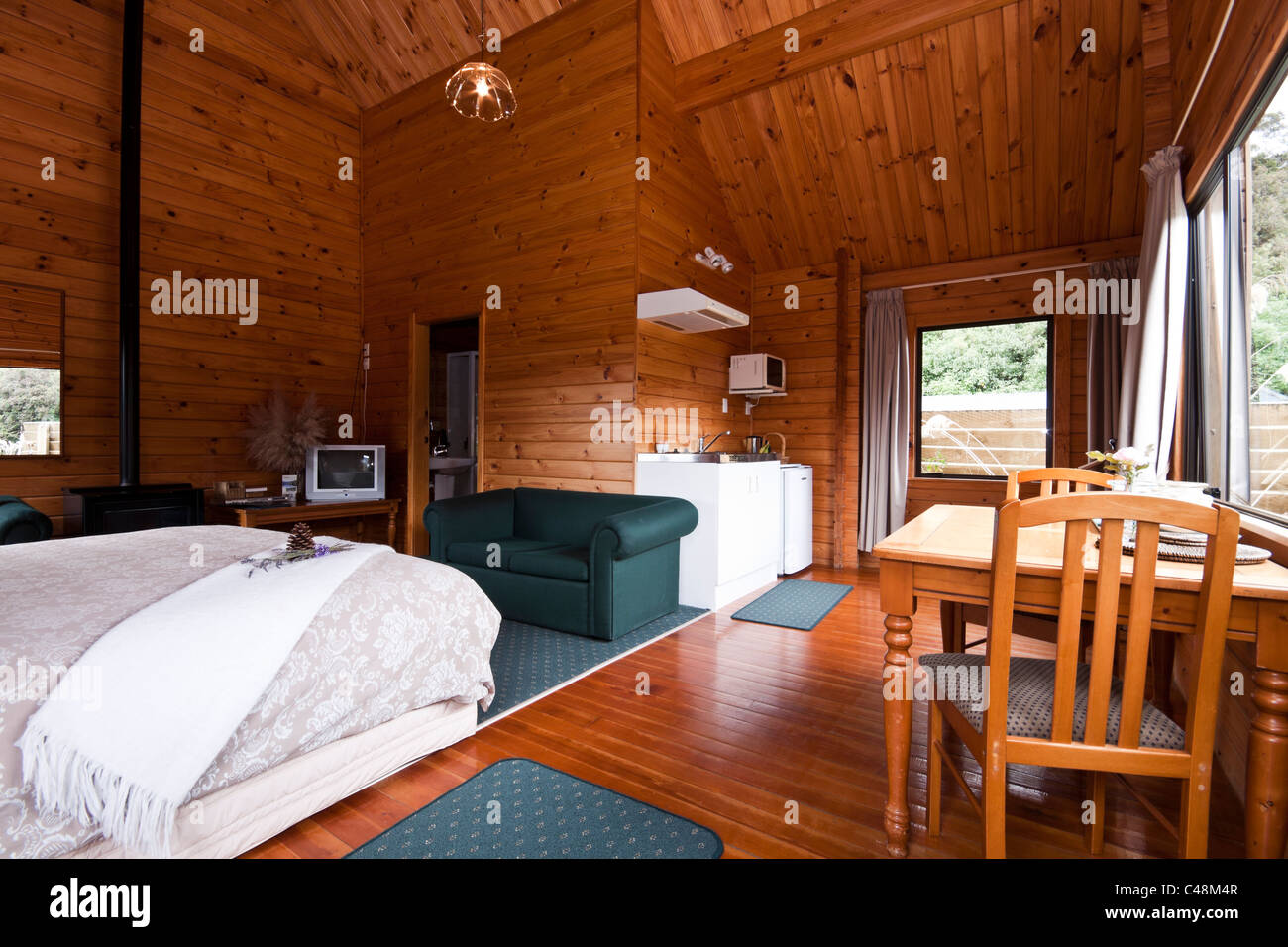 Nice warm interior of mountain lodge apartment. Fox Glacier Lodge, Fox