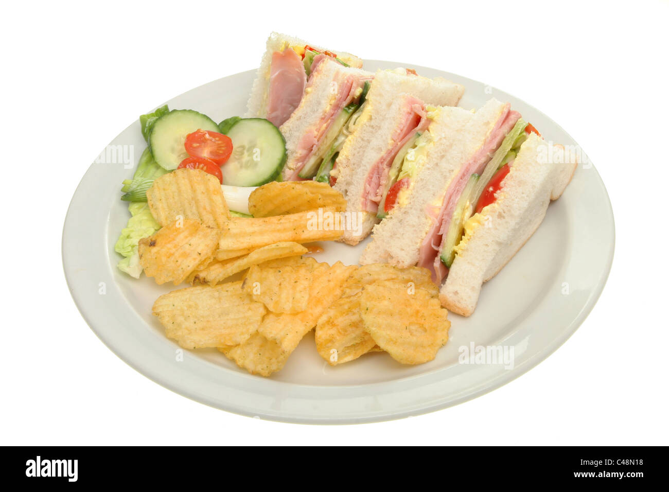 Ham Salad Sandwich With Salad Garnish And Potato Crisps On Plate Isolated Against White Stock Photo Alamy