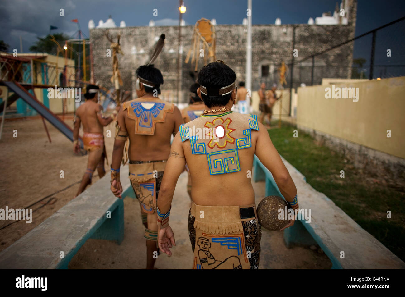 Mayan ball players enter a court before a game in Chapab village in