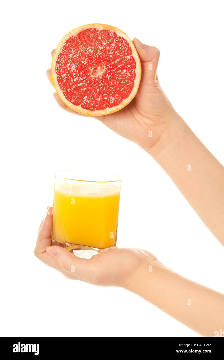Woman's hands with grapefruit fresh juice Stock Photo Alamy