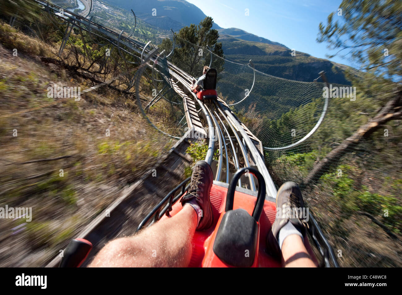 Two men ride the Alpine Coaster above Glenwood Springs at Glenwood