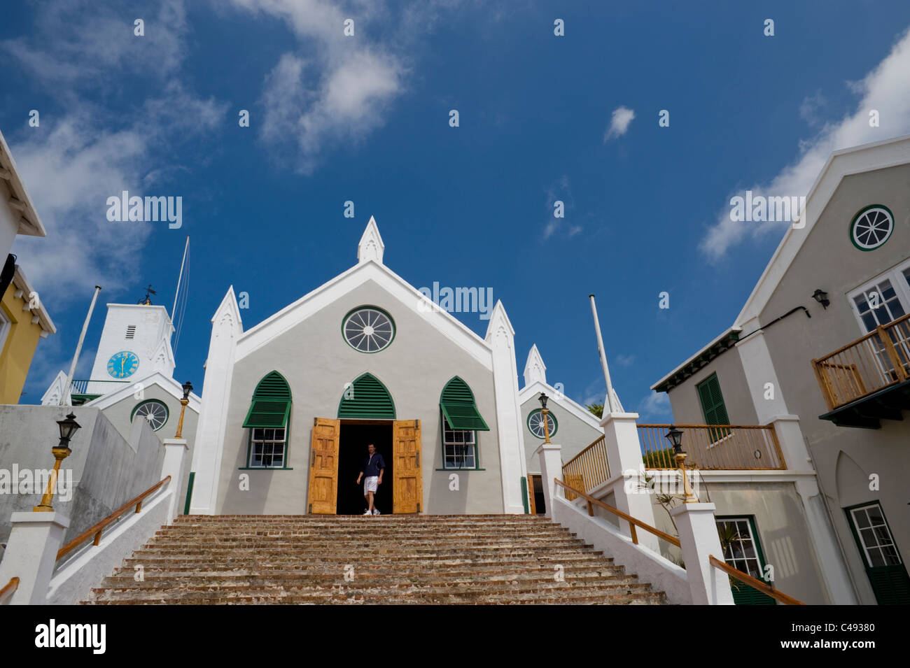 A man walks in the doorway of St. Peter's church, St. George, Bermuda. Stock Photo