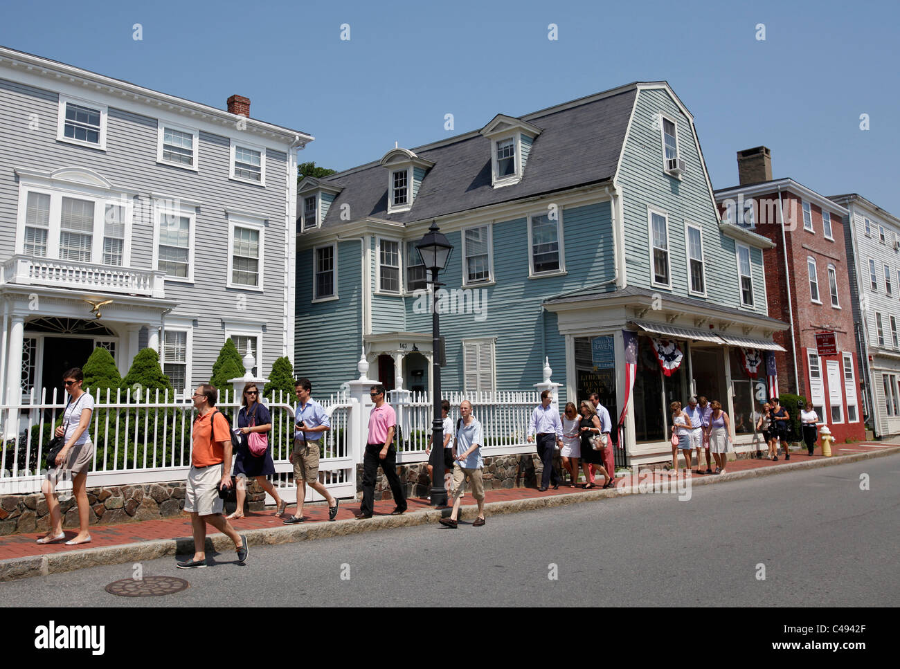 People walk along the main street in the seaside town of Marblehead