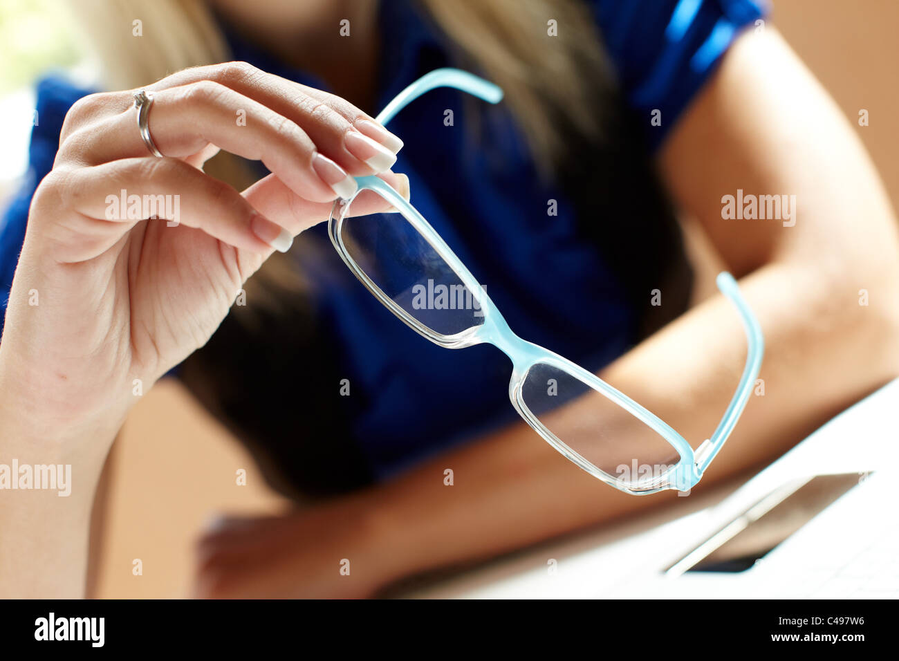 Woman holding glasses Stock Photo