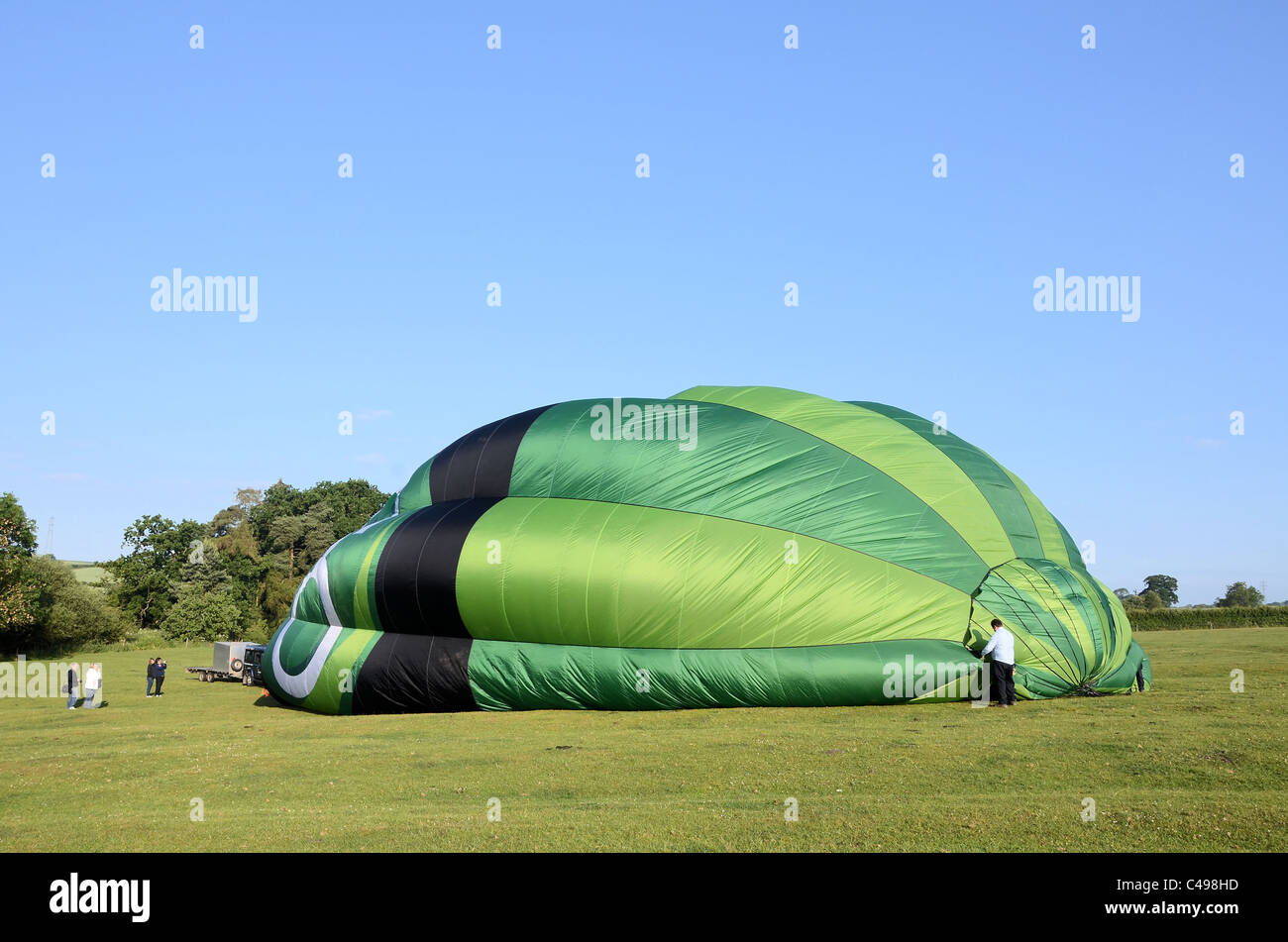 Hot air balloon being inflated Stock Photo - Alamy