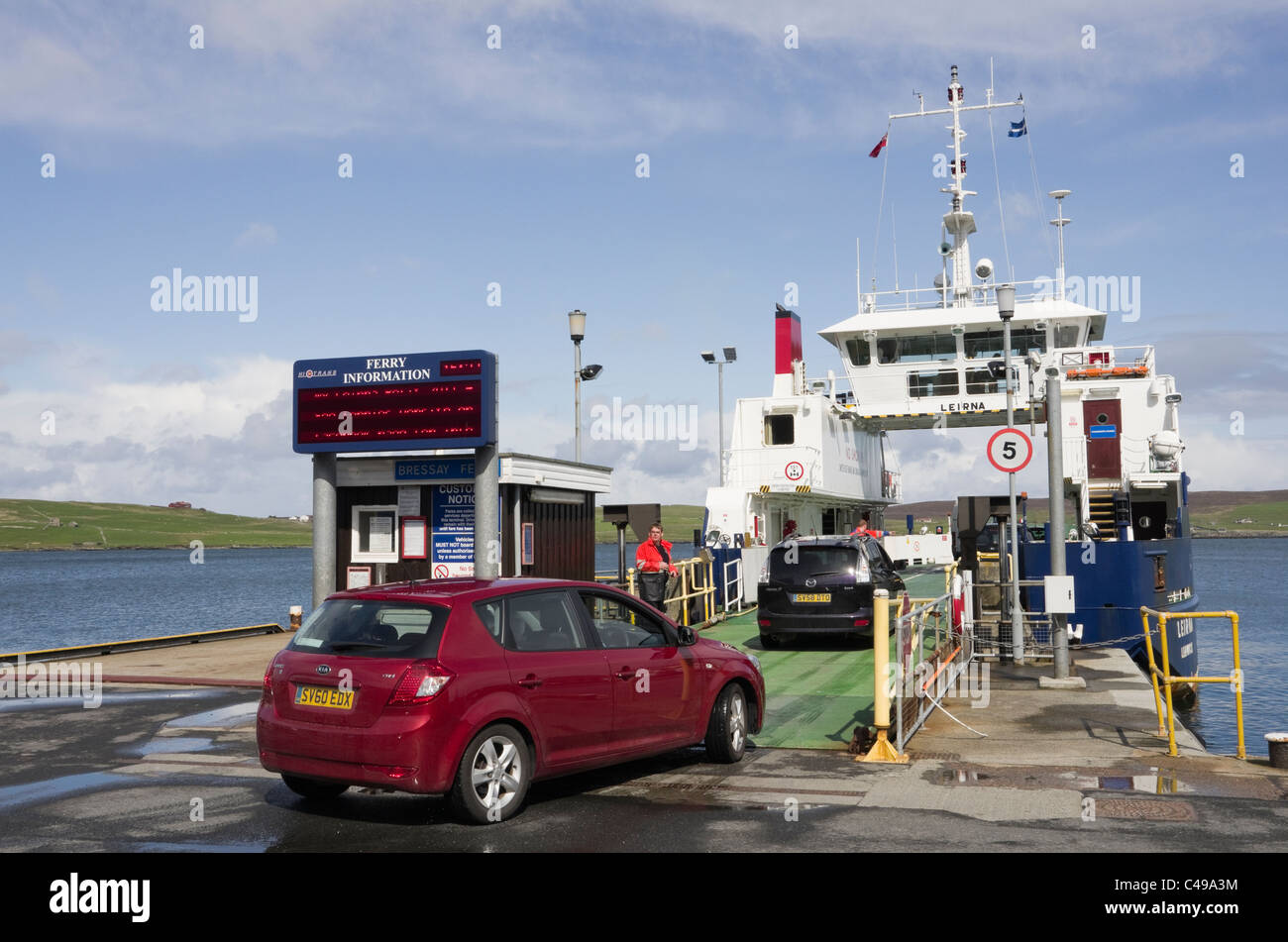 Vehicles loading onto Bressay ferry Leirna at North Jetty in harbour in Bressay Sound. Lerwick, Shetland Islands, Scotland, UK. Stock Photo