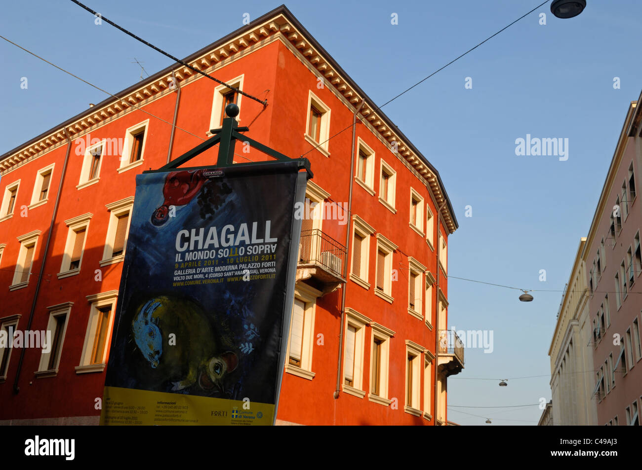 An Art Exhibition poster display on Via Roma in Verona Stock Photo