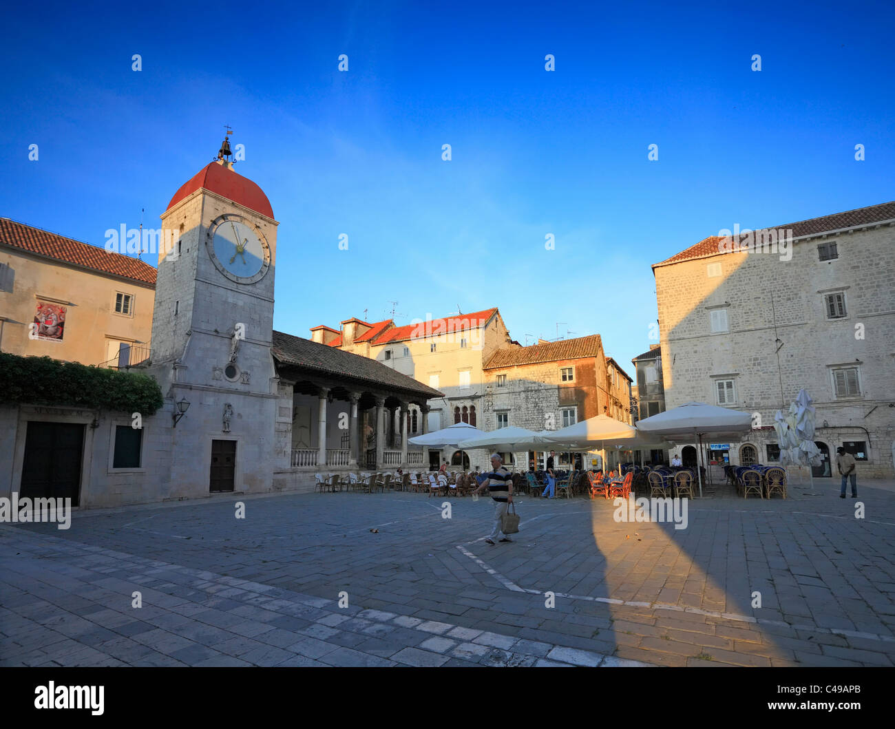 Trogir, Croatia. Old square of Jonh Paul II square with clock tower near cathedral of Stock Photo