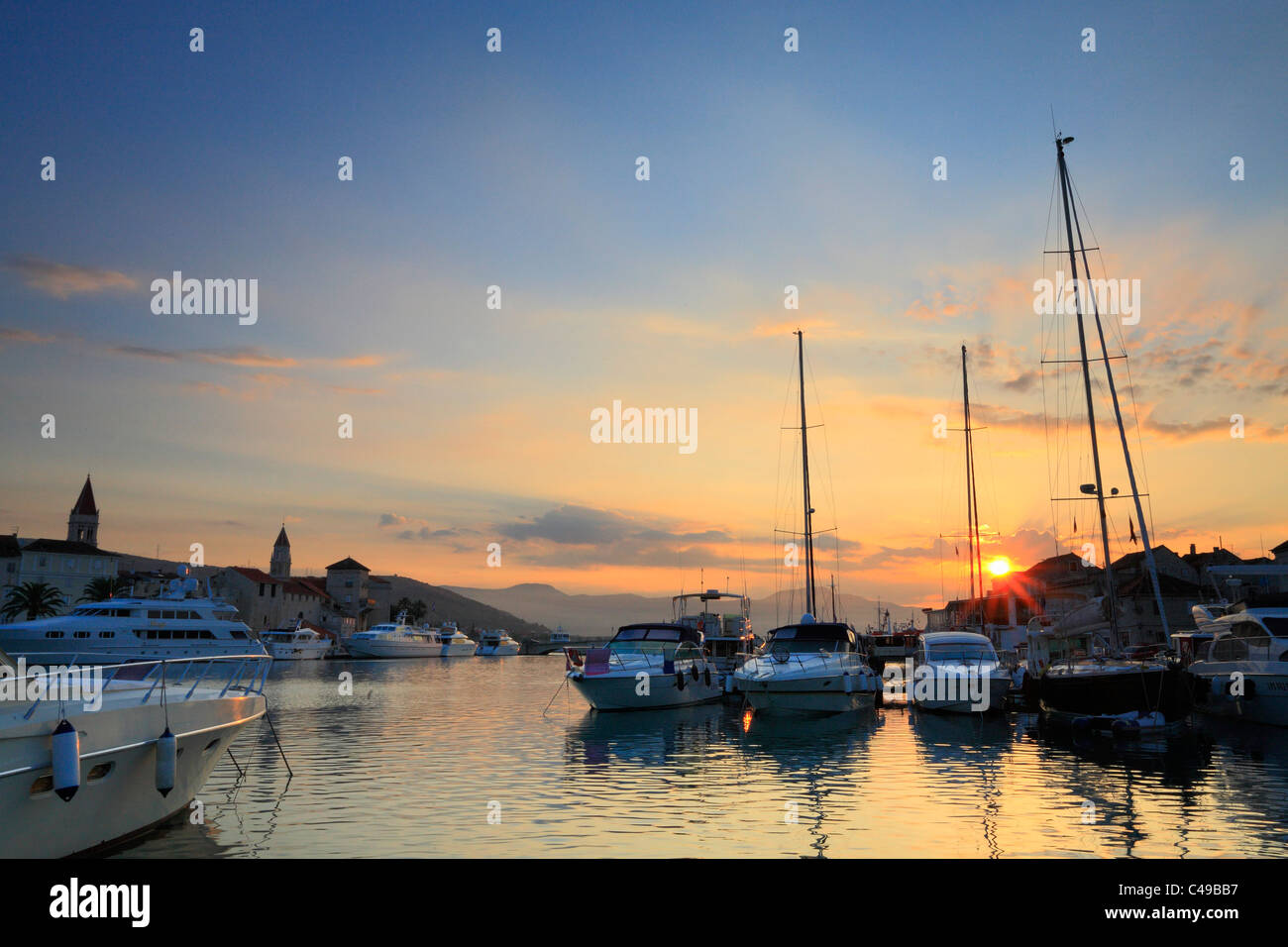 Sunset in the port of Trogir town in Croatia Stock Photo