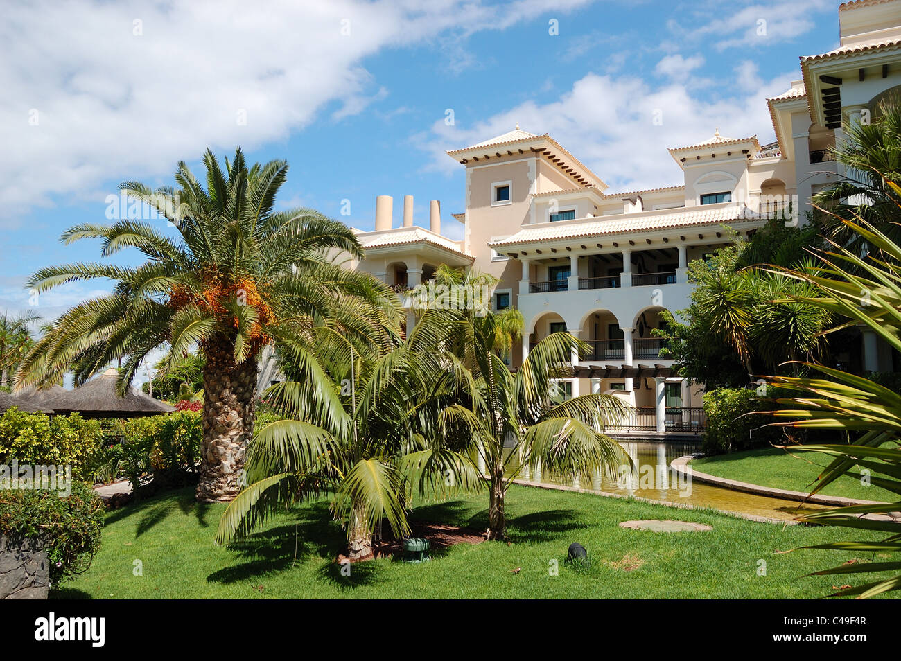 The building of luxury hotel and palm trees, Tenerife island, Spain Stock Photo