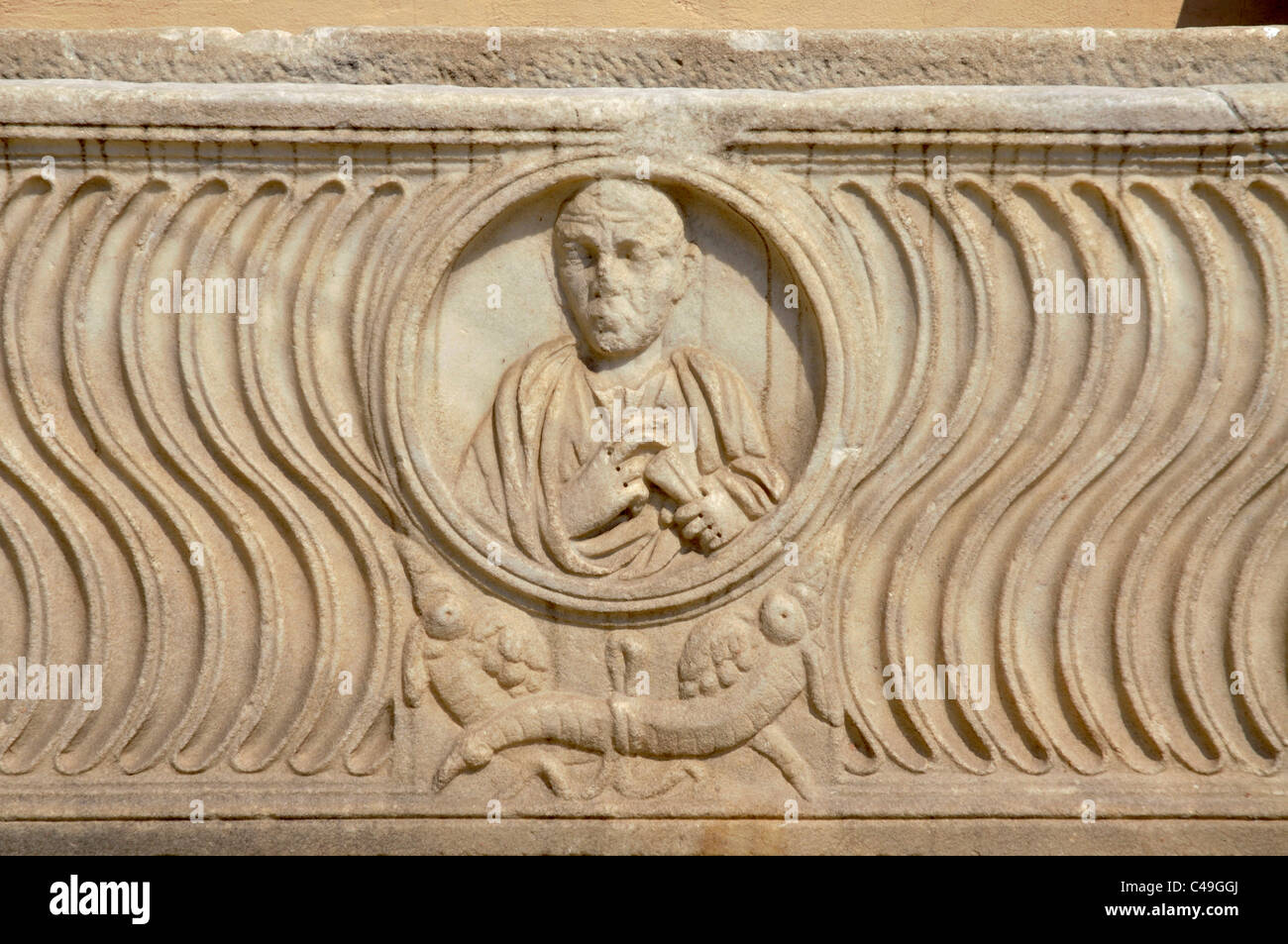 Portrait and decoration on a Roman sarcophagus Stock Photo