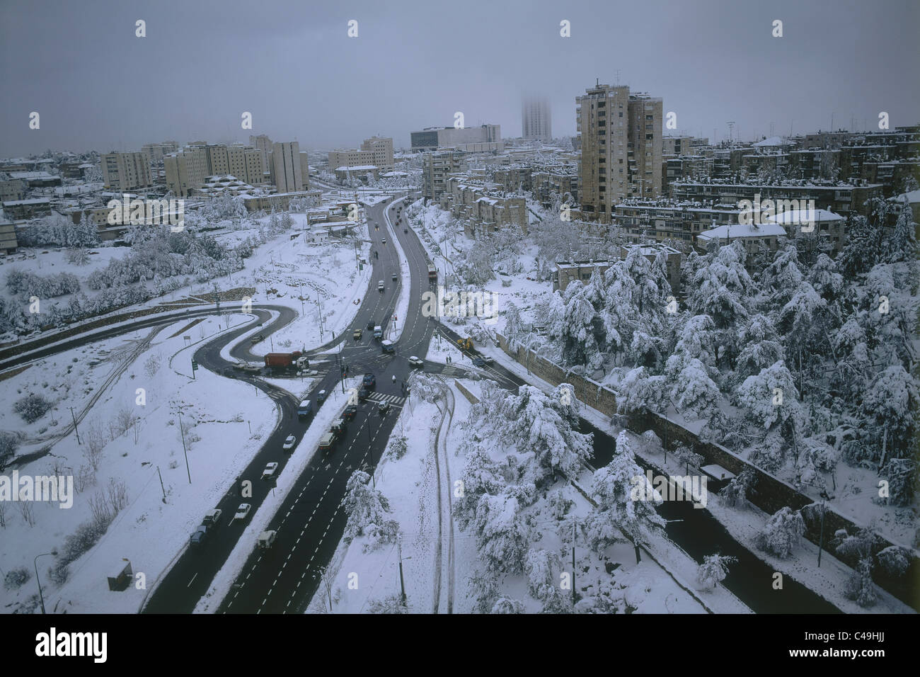 Aerial photograph of the modern city of Jerusalem after a snow storm ...