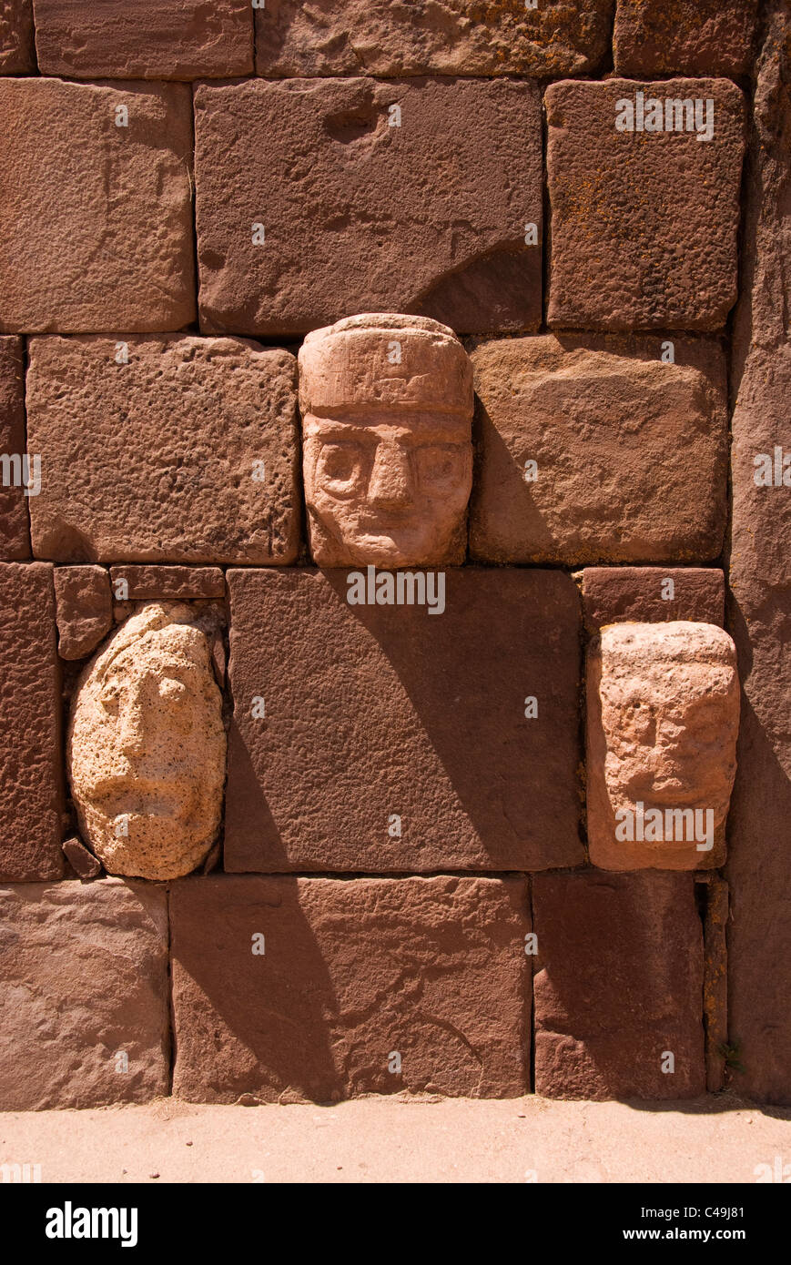 Tiahuanaco 500-900 AD, Subterranean Temple, wall with sculpted heads. Stock Photo