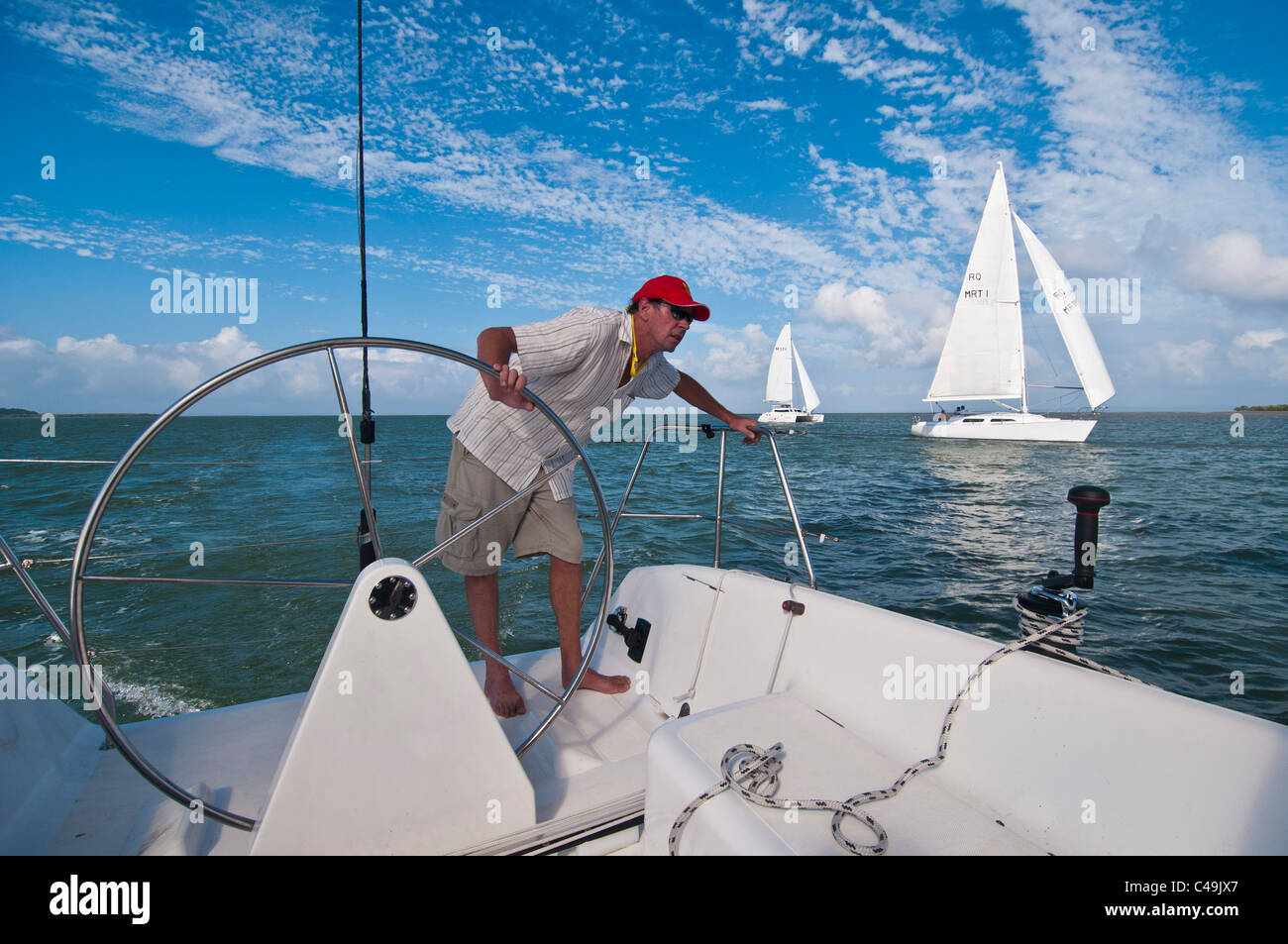 sailboat-captain-steering-while-sailing-on-moreton-bay-queensland-australia-stock-photo-alamy