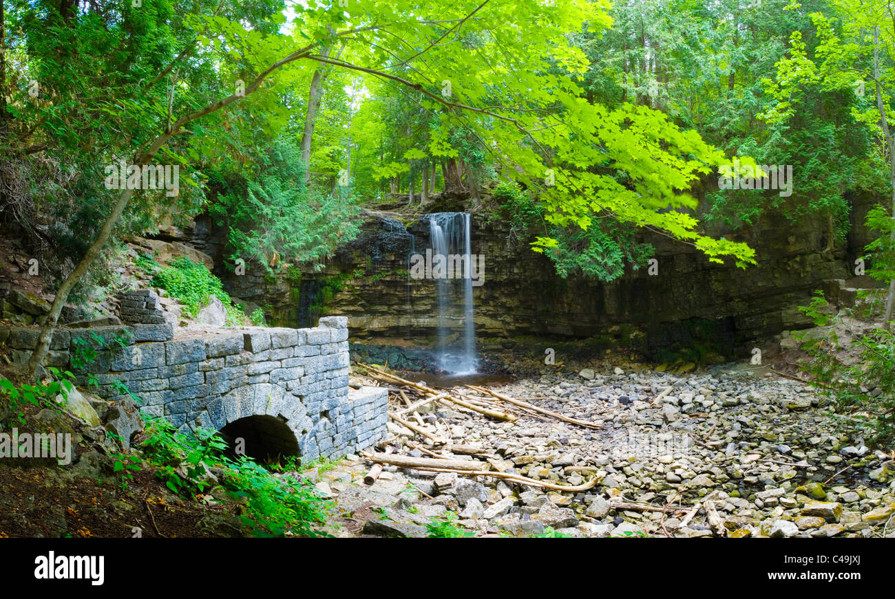 Waterfall and Millpond ruins along the Niagara Escarpment outside Hamilton Ontario Stock Photo