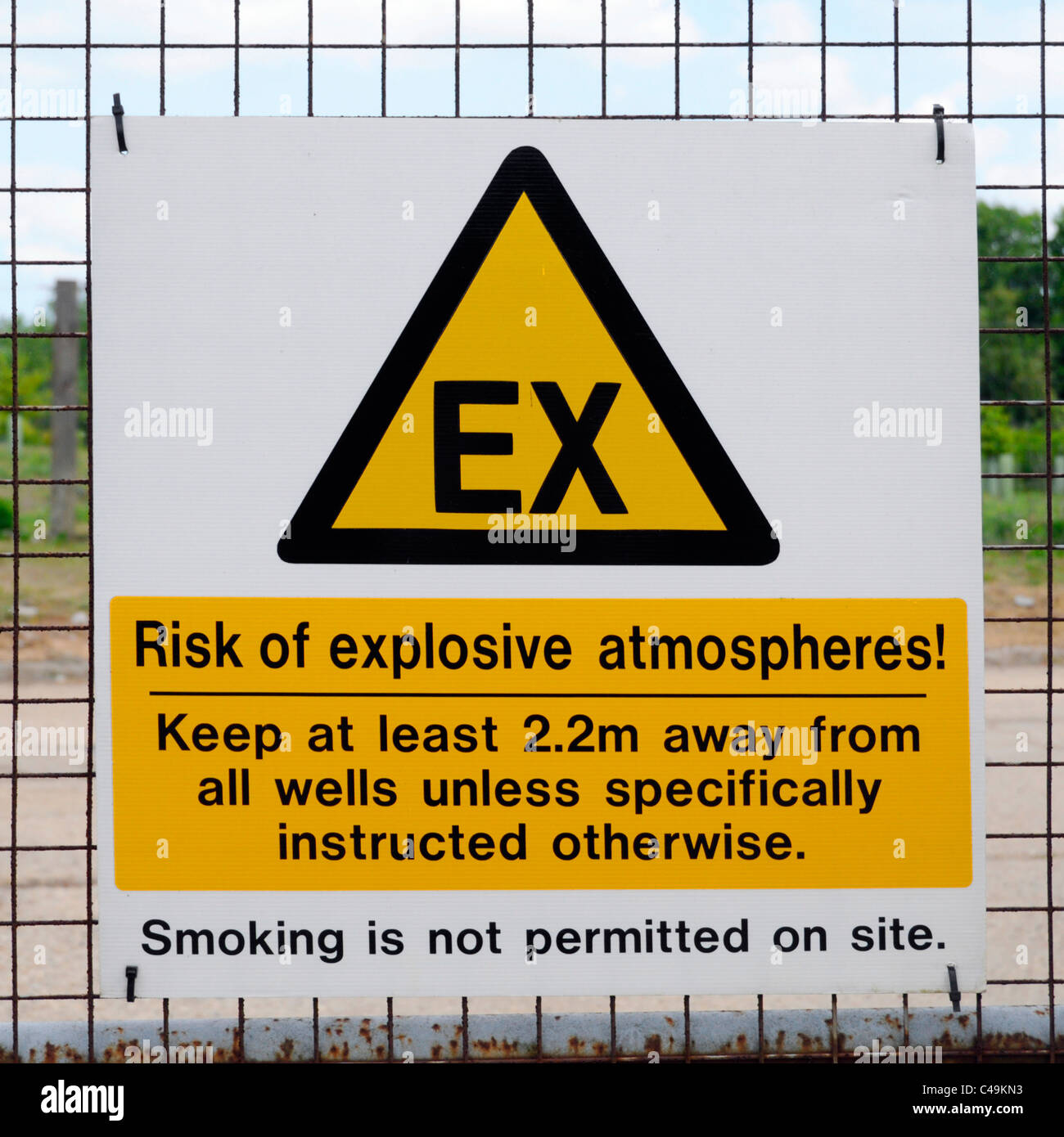 Waste management explosive atmosphere warning signs on closed landfill site after landscaping & well installations in rural area of Essex England UK Stock Photo