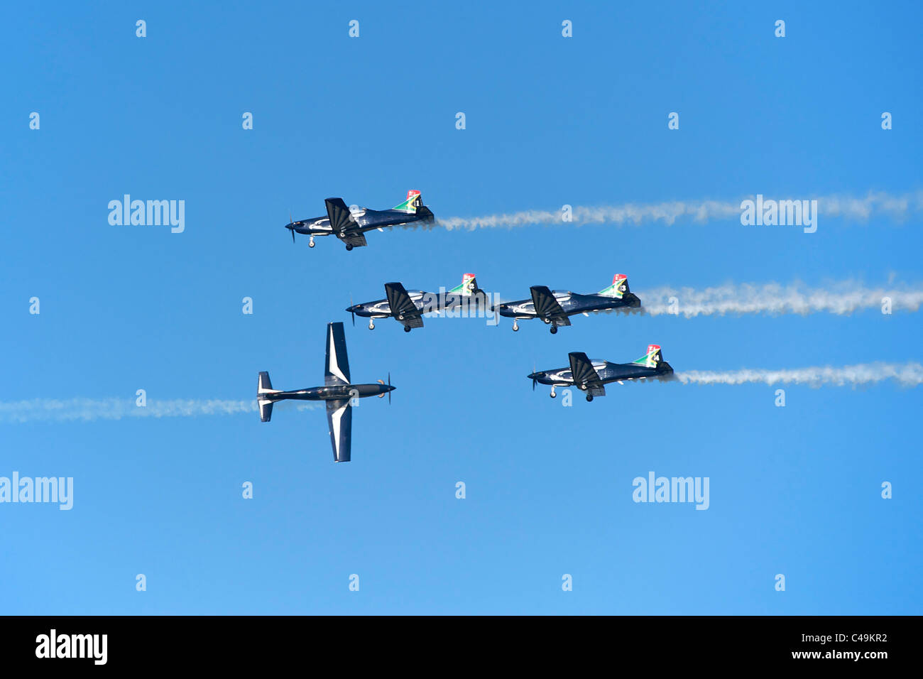 The Silver Falcons, the South African Air Force's display team, flying at an air show in their Pilatus PC-7 Mk II Astras. Stock Photo
