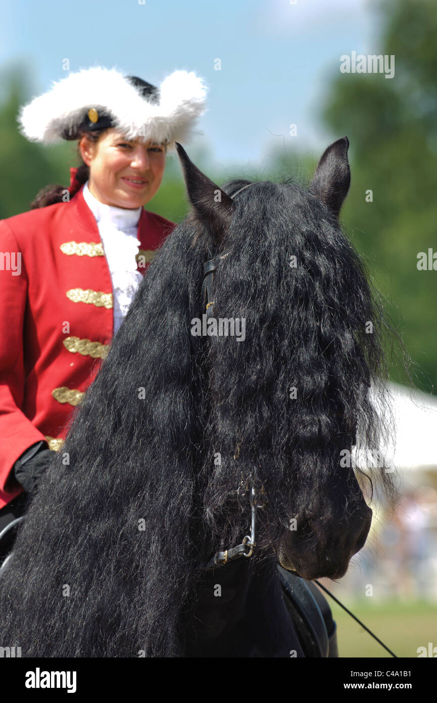 portrait of horse breed Friese and baroque rider Stock Photo