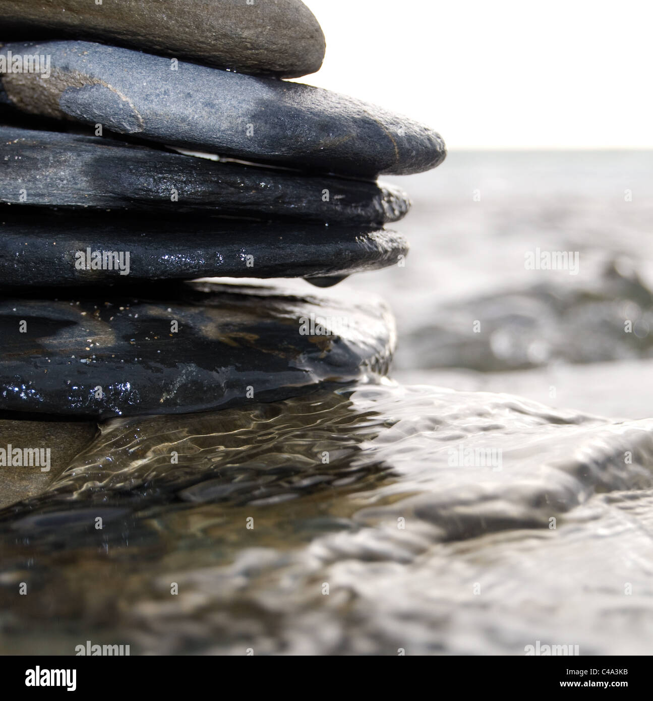 Wet rock calm water close hi-res stock photography and images - Alamy