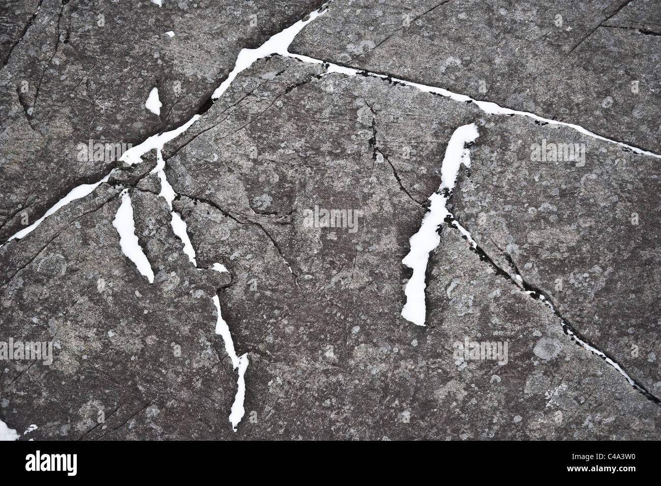 Rock cracks covered in snow. Winter, shape Stock Photo