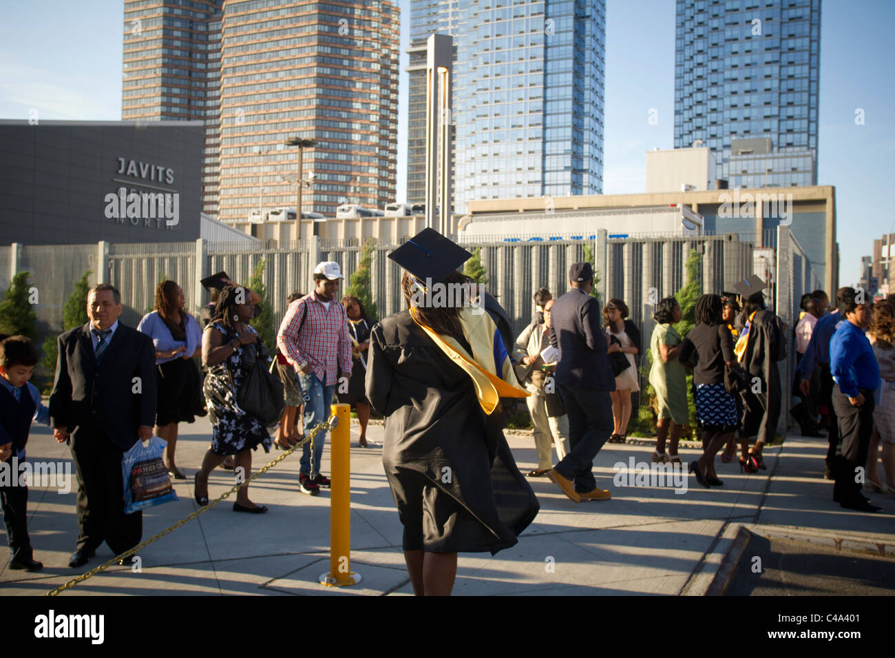 Graduates outside of the Jacob Javits Convention Center in NY after the John Jay College commencement Stock Photo