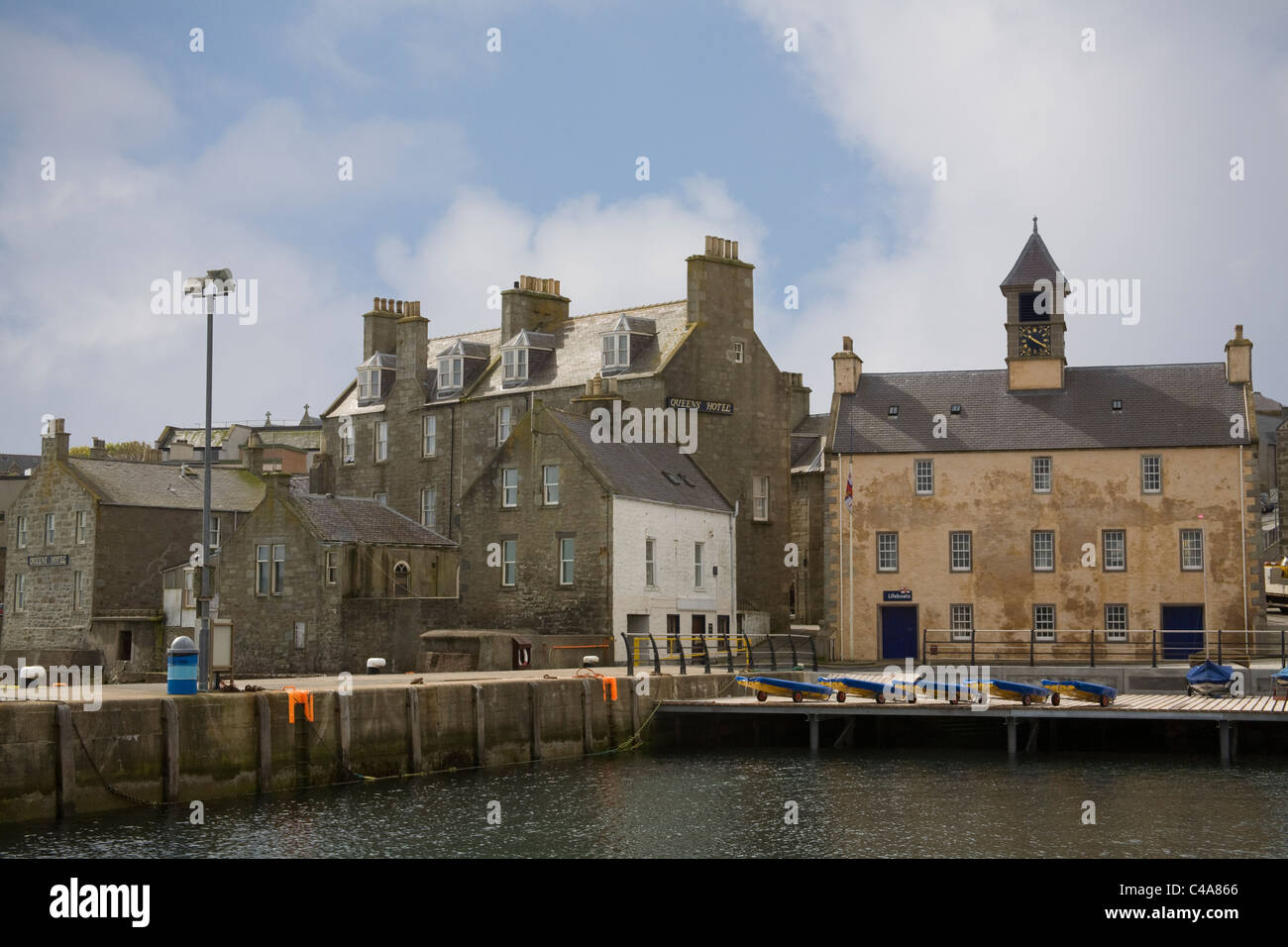 Lerwick Scotland UK The Lifeboat building and the Queens Hotel on the harbour front of this main Shetland Island Stock Photo