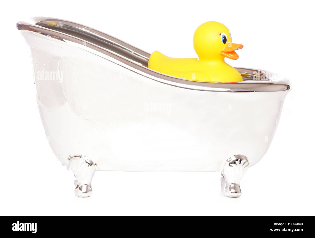 yellow rubber duck in a bath studio cutout Stock Photo - Alamy