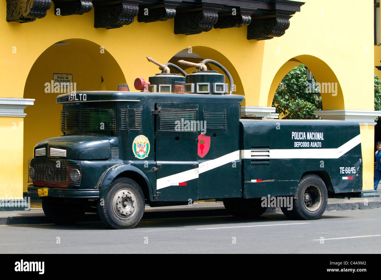 National police water cannon vehicle used for crowd control, parked at the Plaza Mayor or Plaza de Armas of Lima, Peru. Stock Photo