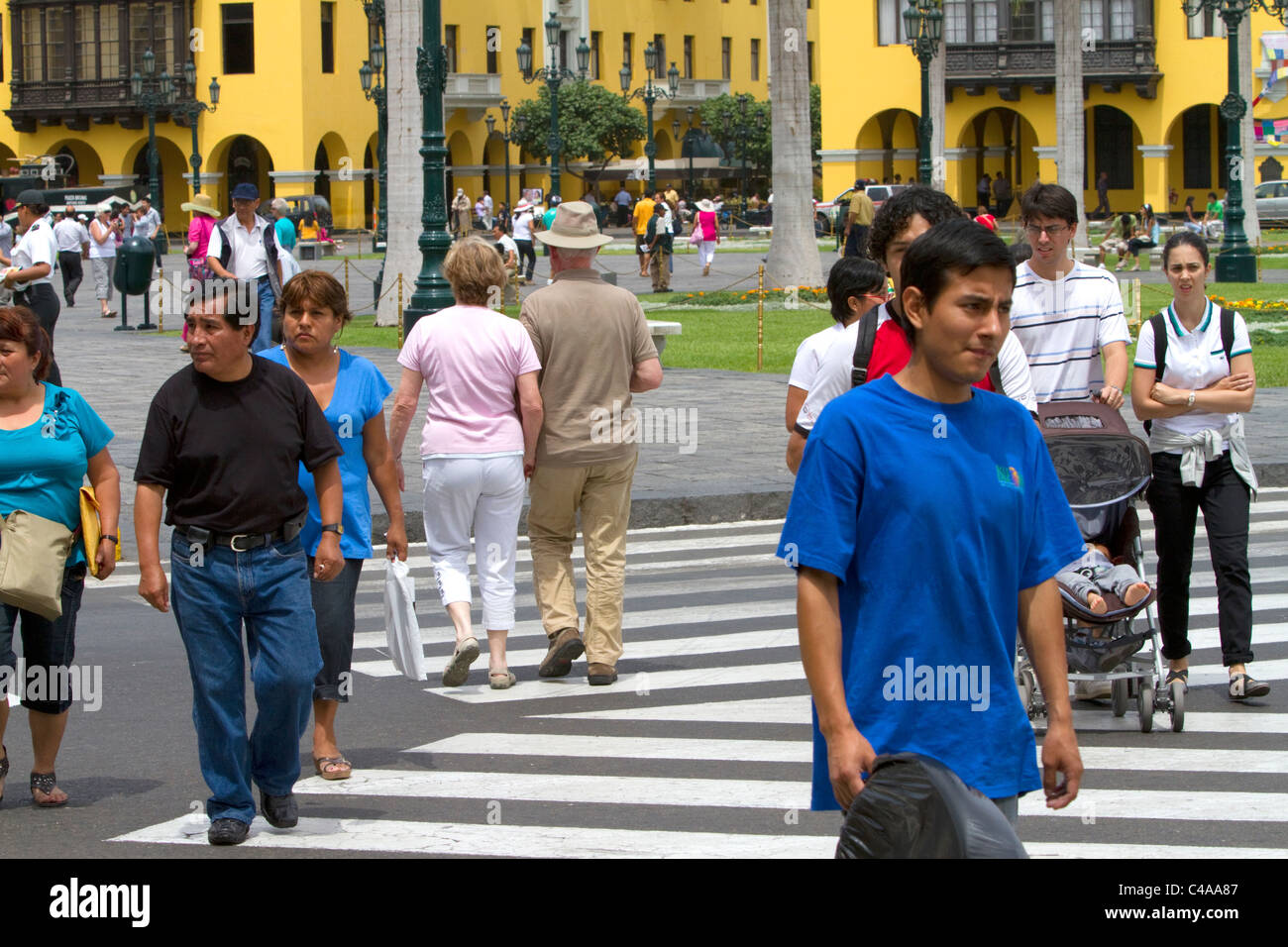 Pedestrians at the Plaza Mayor or Plaza de Armas of Lima, Peru. Stock Photo