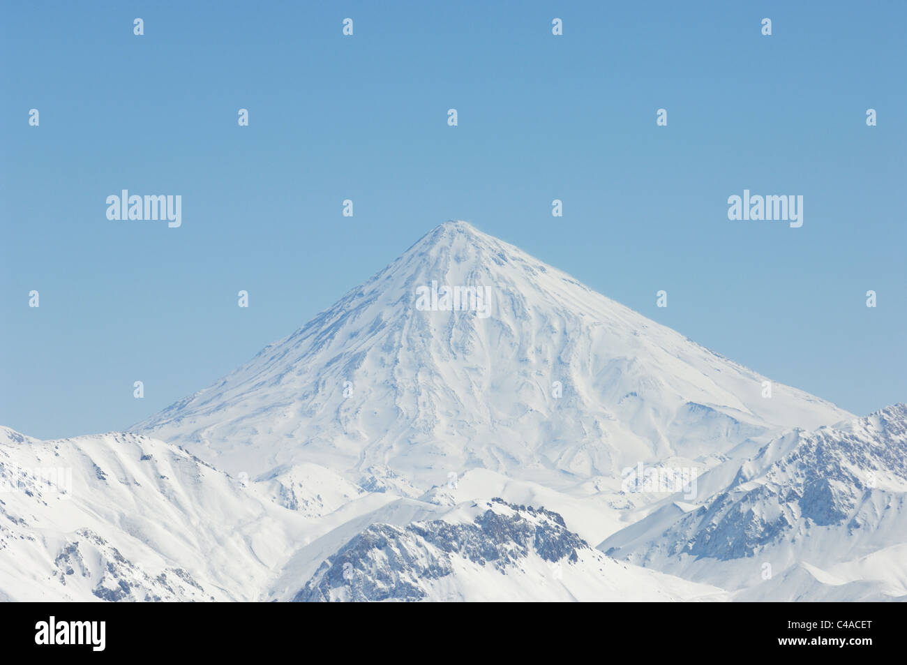 A snow covered Mount Damavand in the Alborz mountains of Iran Stock Photo