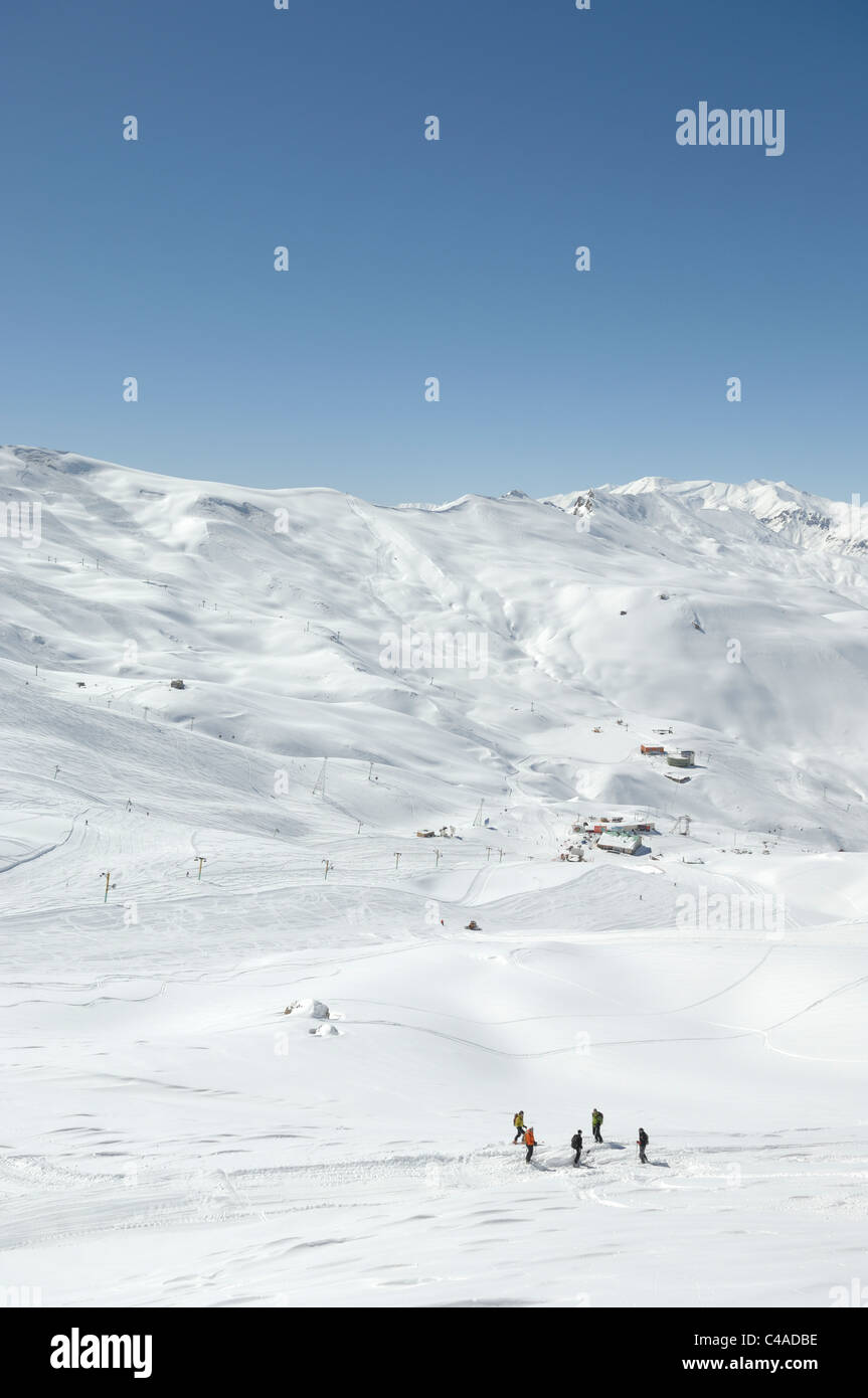 Dizin ski resort in the Alborz mountains of Iran under a blue sky Stock Photo