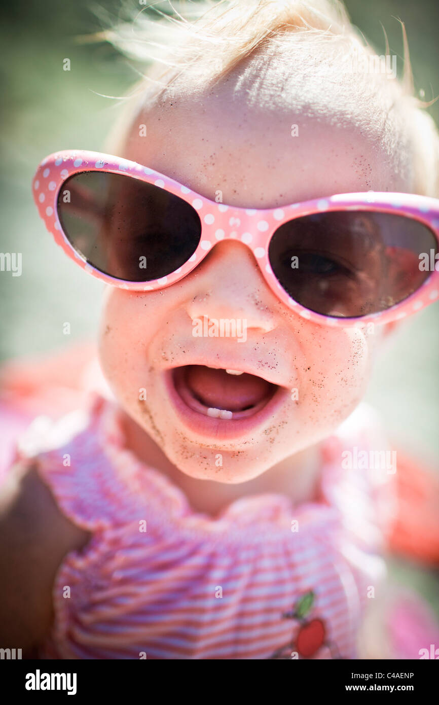Toddler Girl Wearing Big Sunglasses at the Beach Stock Photo Alamy