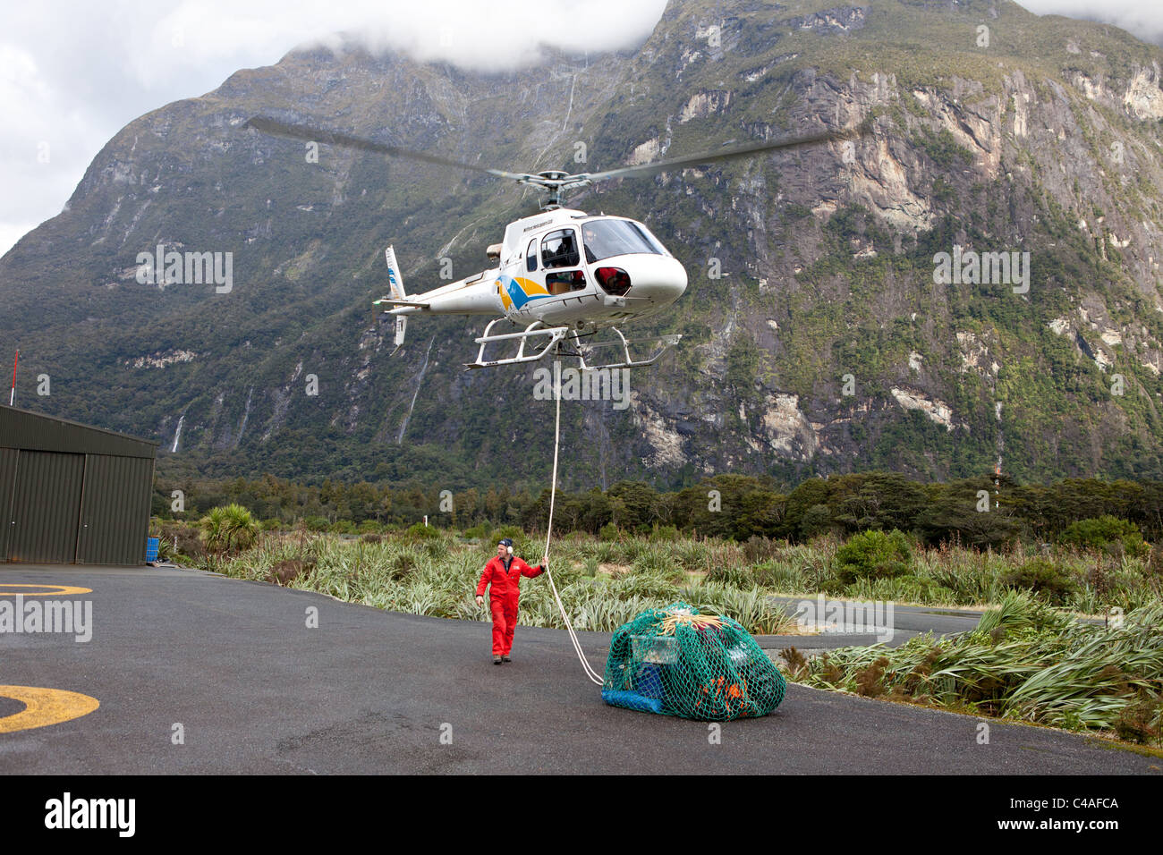 Small transport helicopter, Milford Sound airport, New Zealand Stock Photo