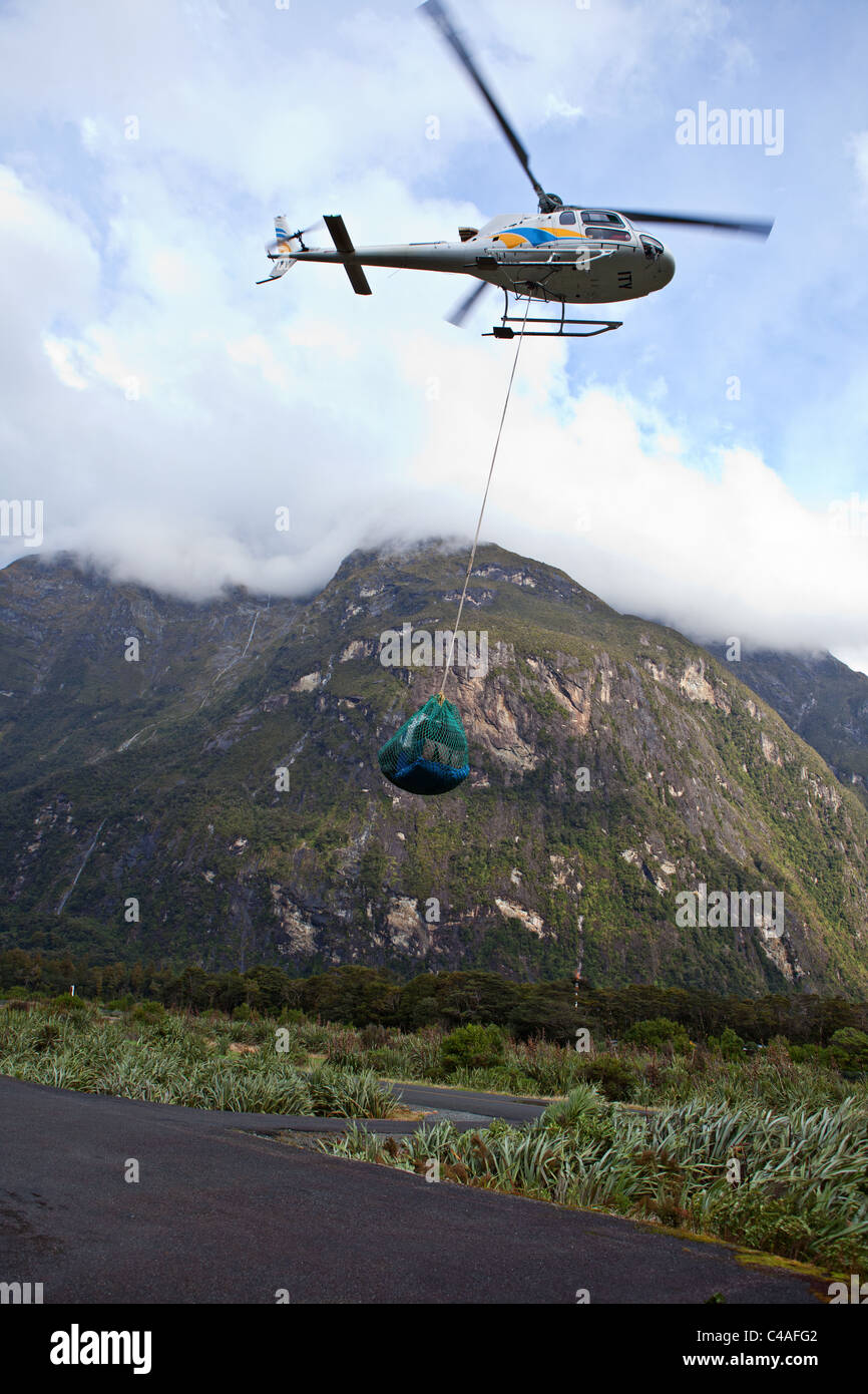 Small transport helicopter, Milford Sound airport, New Zealand Stock Photo