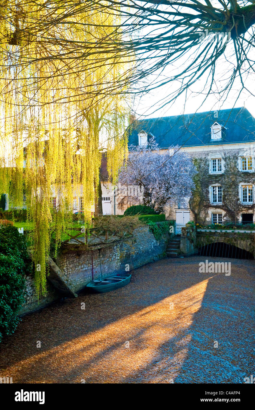 River and garden of old mill - Indre-et-Loire, France. Stock Photo
