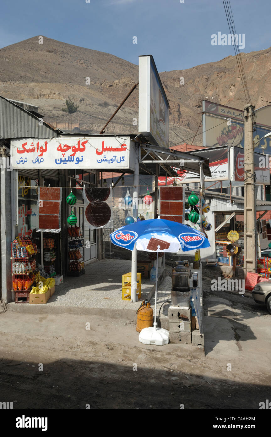 Shops along the main highway through Reyneh in the Alborz mountains of Iran Stock Photo