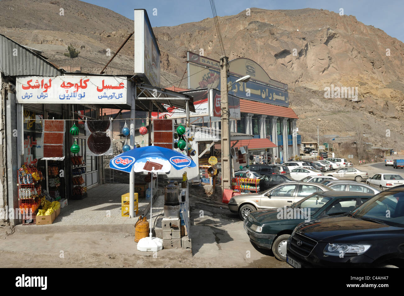 Shops along the main highway through Reyneh in the Alborz mountains of Iran Stock Photo