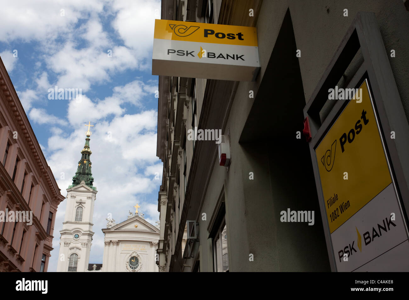 PSK Postal Savings Bank sign in front of Maria Treu Church, Austria.  Photo:Jeff Gilbert Stock Photo - Alamy