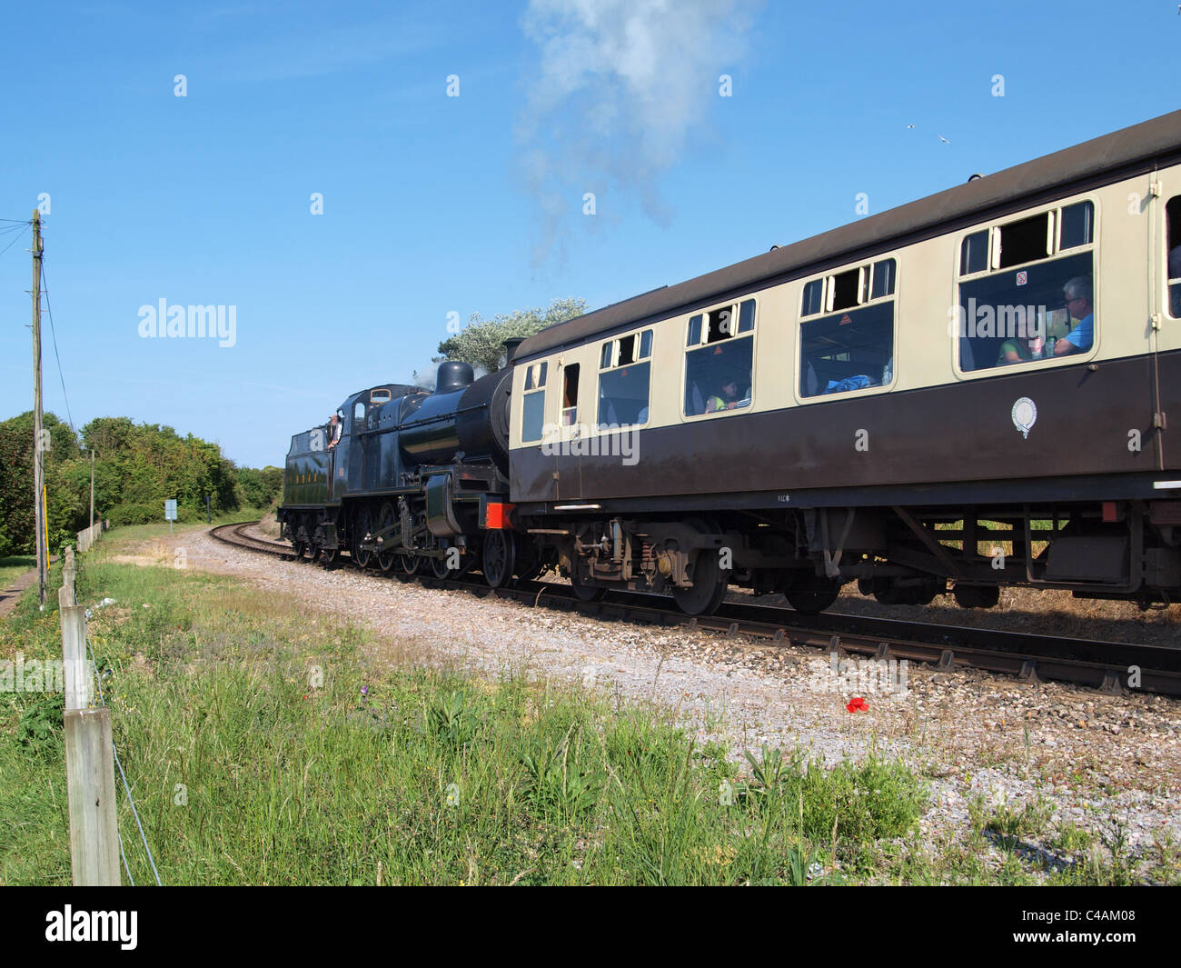 Steam Locomotive leaving Watchet Station. West Somerset Railway. UK Stock Photo