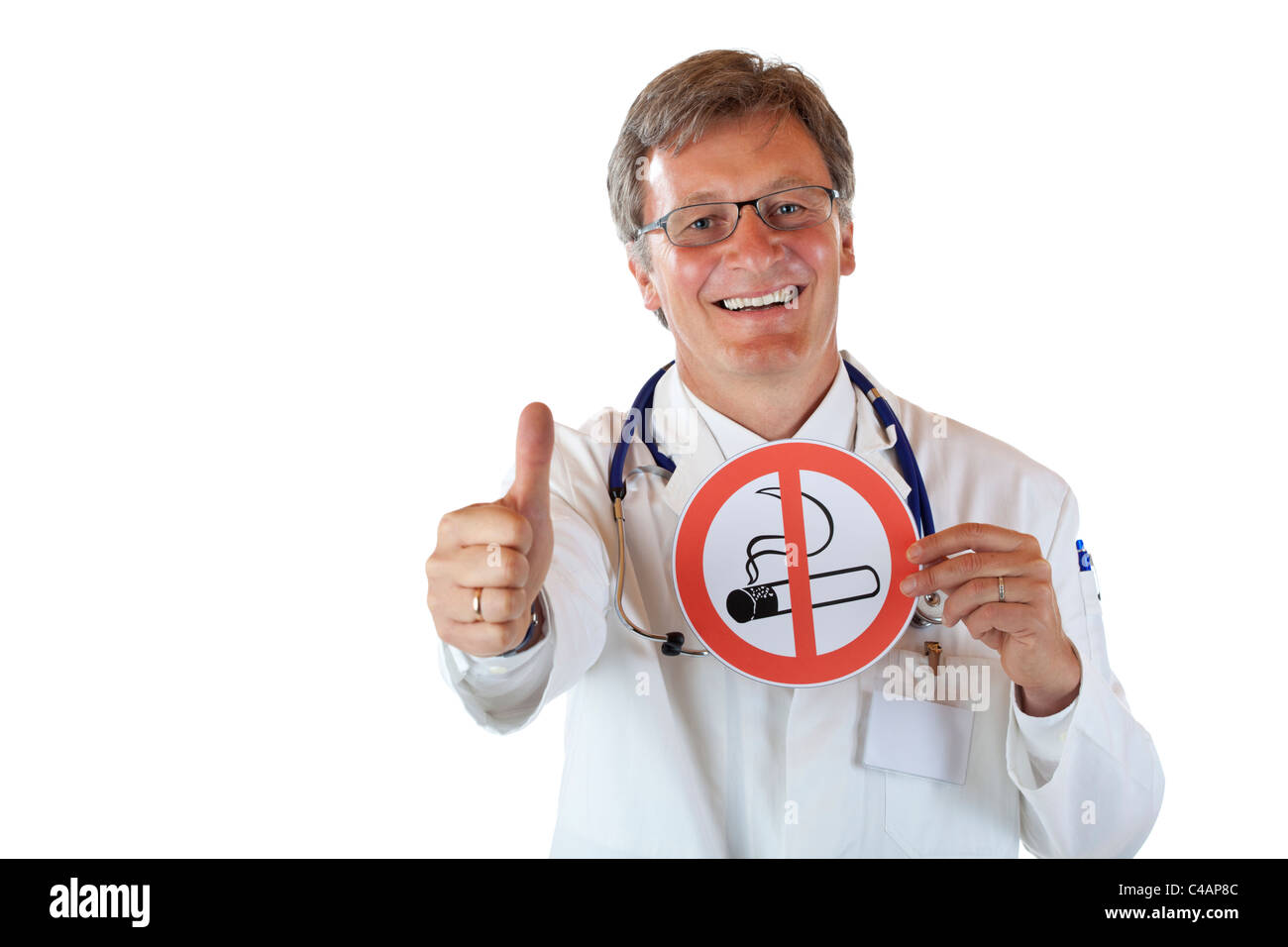 Happy smiling doctor holds smoking ban sign and shows thumb up. isolated on white background. Stock Photo