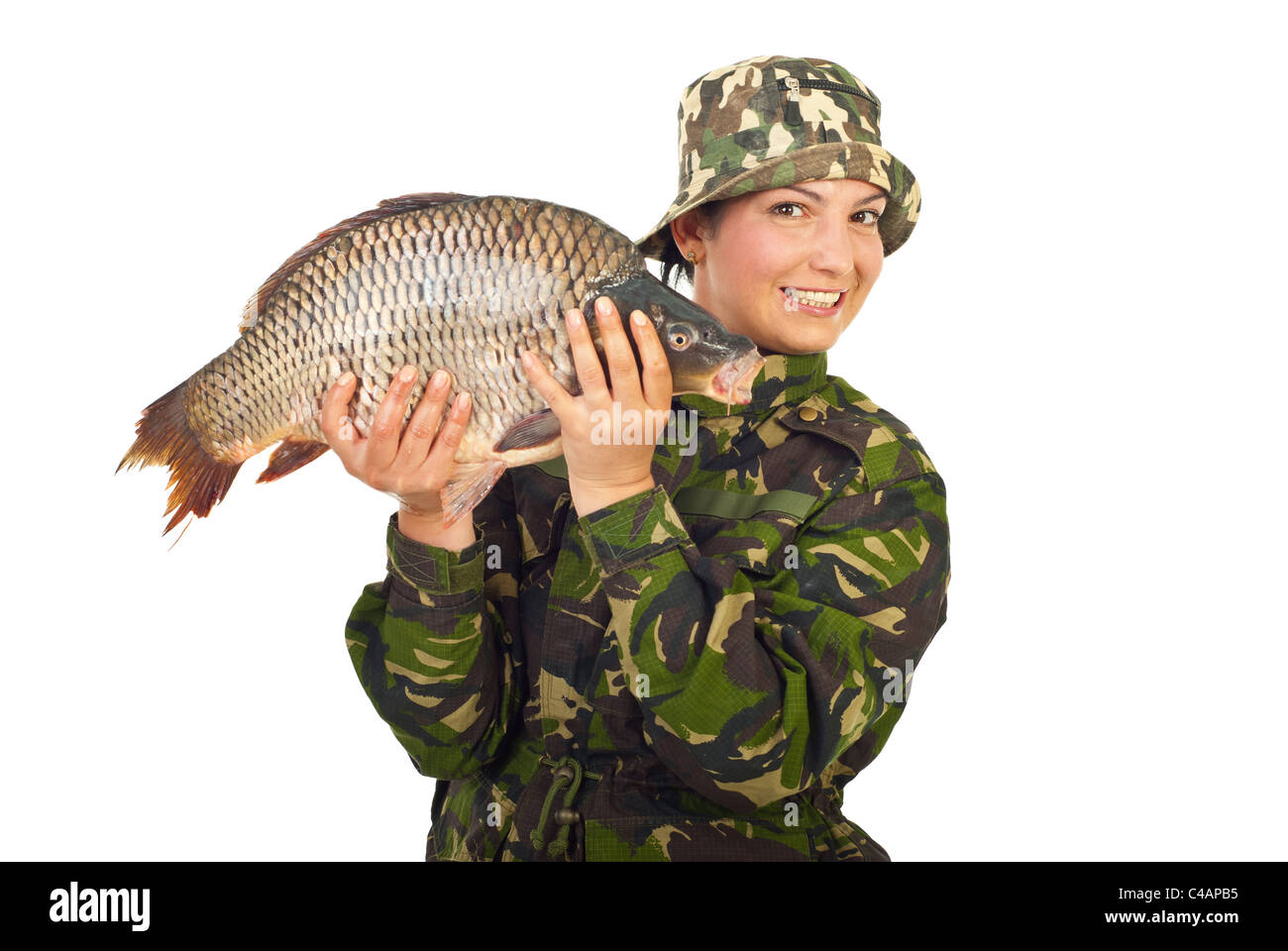 Angler woman showing a big carp isolated on white background Stock Photo