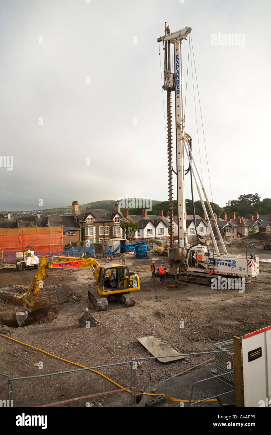 'Expanded Piling' Contractors preparing the groundworks foundations piling for a new hospital extension, Aberystwyth Wales UK Stock Photo