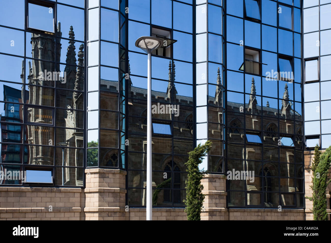 Reflection of Saint Andrews Metropolitan Cathedral, recently restored, Clyde Street, Glasgow, Scotland Stock Photo