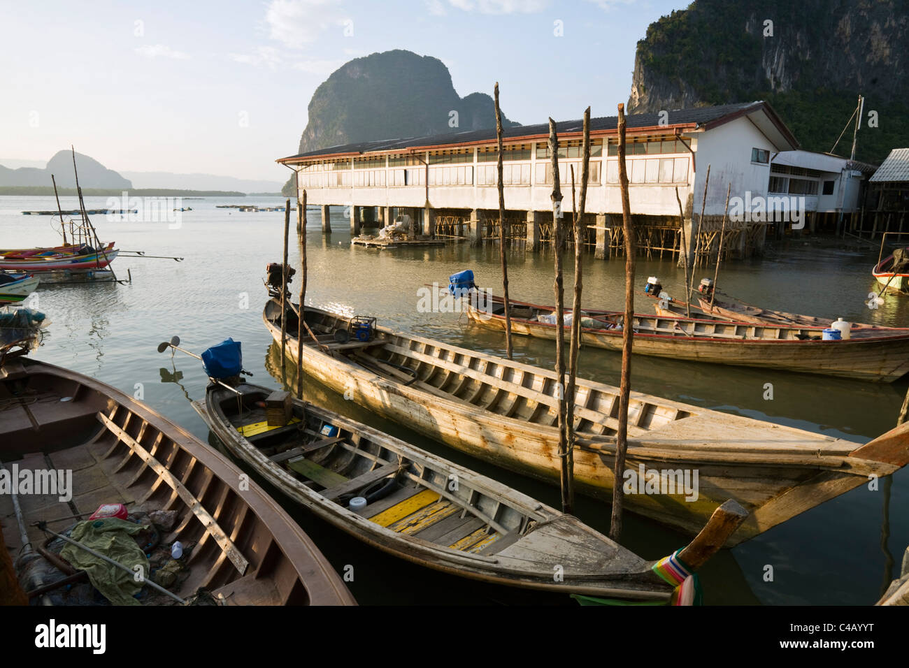 Thailand, Phang-Nga, Ko Panyi.  Long-tail fishing boats at the Muslim village of Ko Panyi. Stock Photo