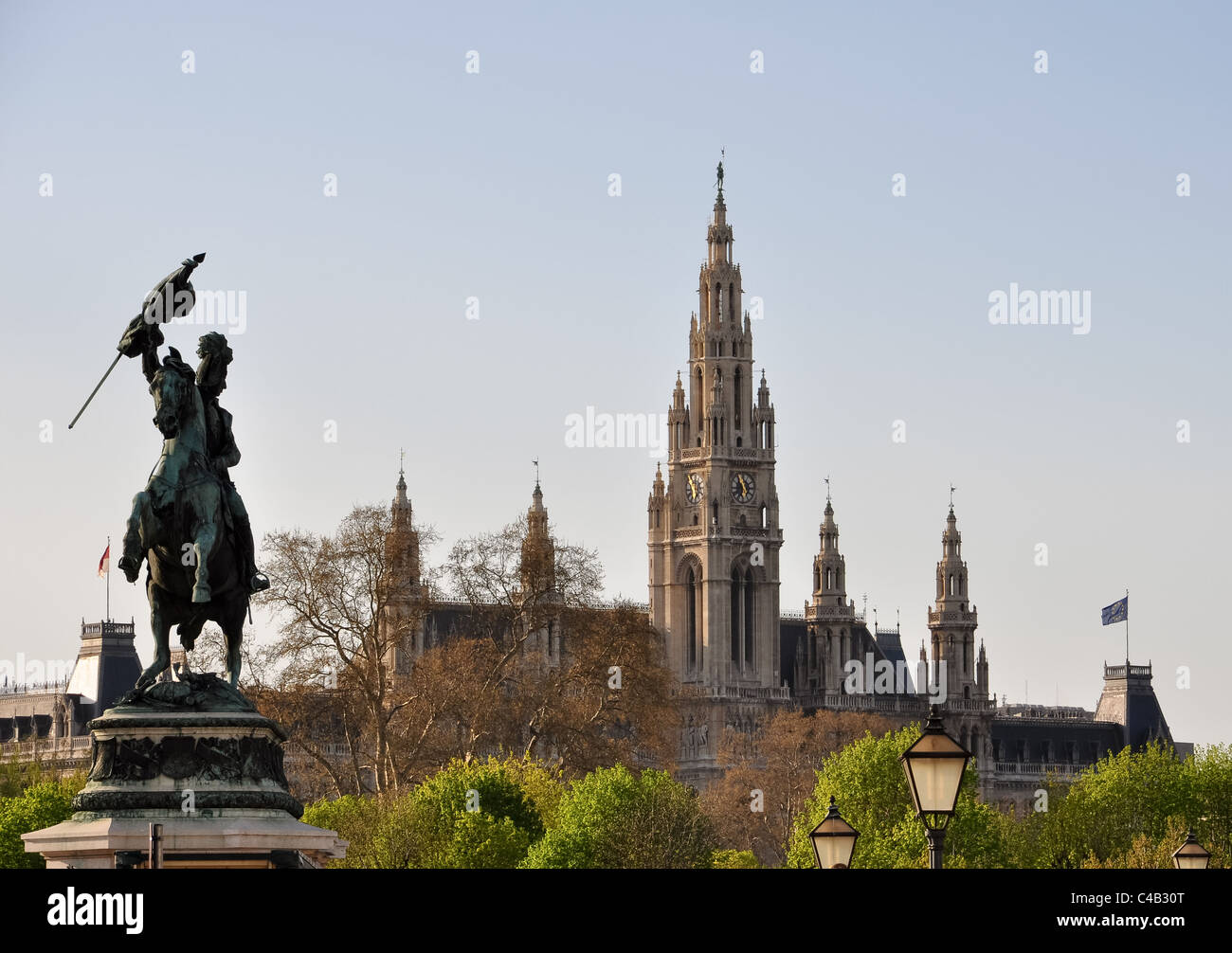 riding statue of arch duke charles in front of vienna's gothic town hall Stock Photo