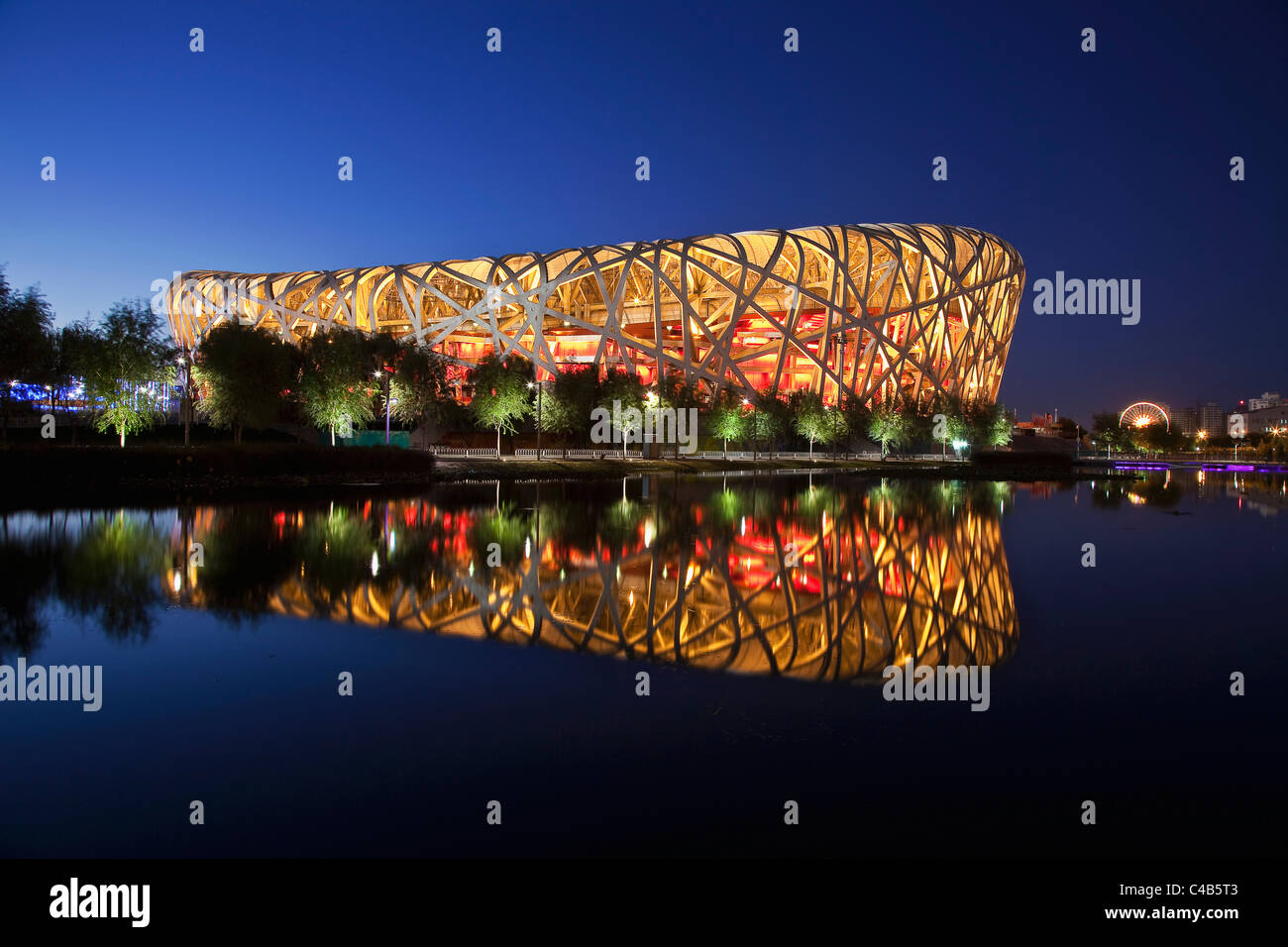 Exterior of the Olympic Stadium, Datun, Beijing, China by night Stock Photo