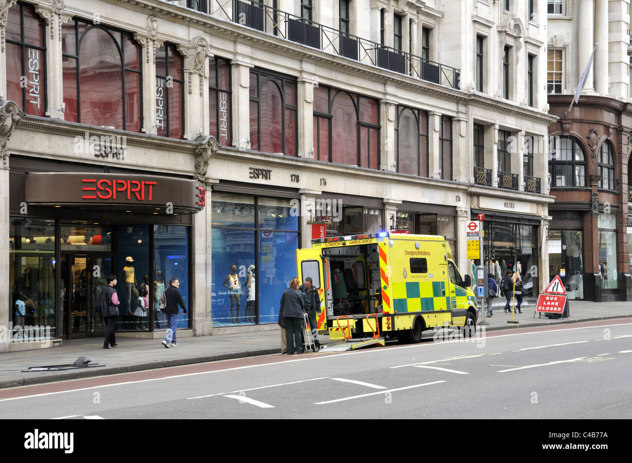 London emergency ambulance attending a call on Regent Street. Stock Photo